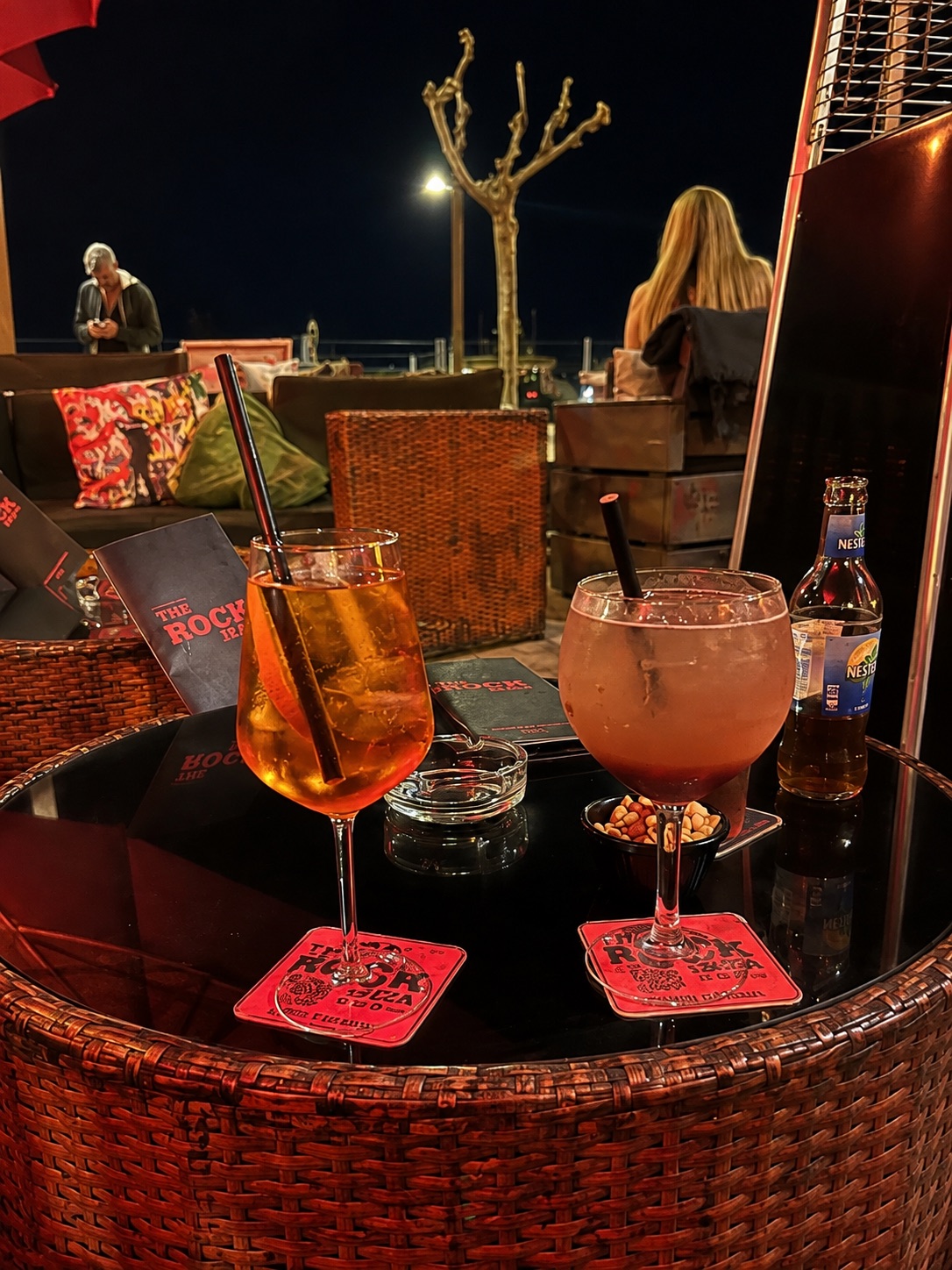 Cocktails on a terrace table at The Rock Ibiza