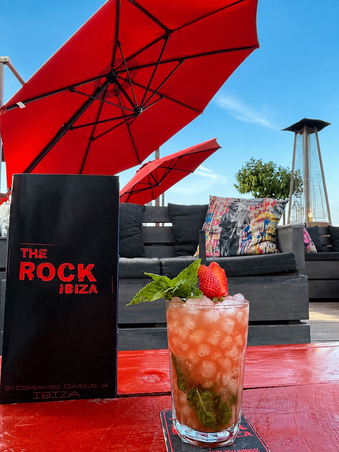 Pink cocktail on The Rock Ibiza terrace